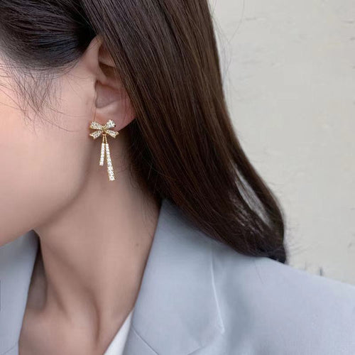 Pendientes de diamantes con lazo francés